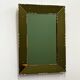 Striking French amber-coloured mirror with sculpted edge details, 1940s