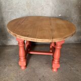 Round coffee table made of solid wood in orange color (soft color)