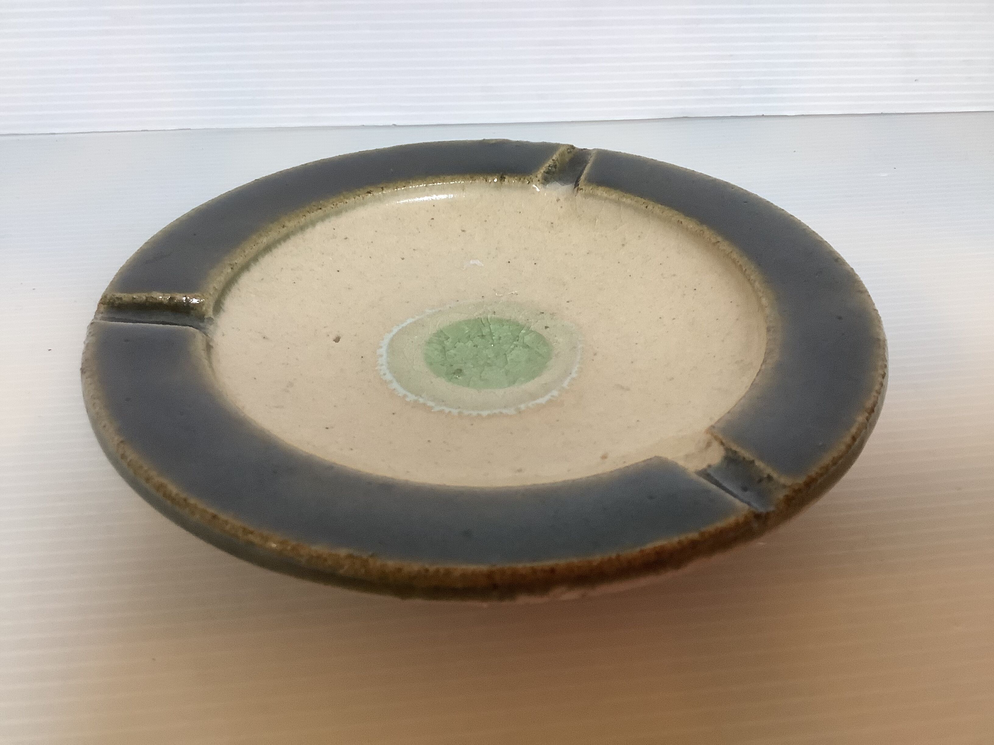 Green khaki beige ceramic ashtray tray.
