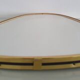 Miroir ovoïde vintage bords doré et noir - années 1960