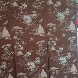 large antique headboard with 4 panels featuring Asian decor from the 1940s/50s