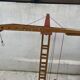 Vintage wooden crane toy from the 60s