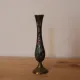 Vintage brass soliflore vase with black, red, and green floral decoration – H 18 cm