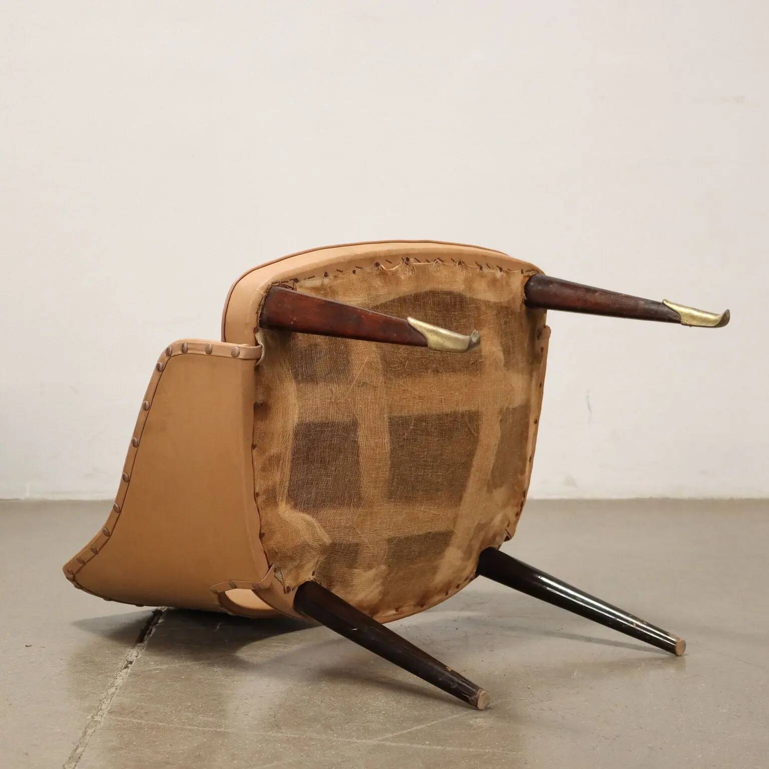 Pair of vintage armchairs from the 50s-60s in ebony wood, brass, with padded seats.
