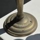 Pair of classic candlesticks in patinated gold metal H25
