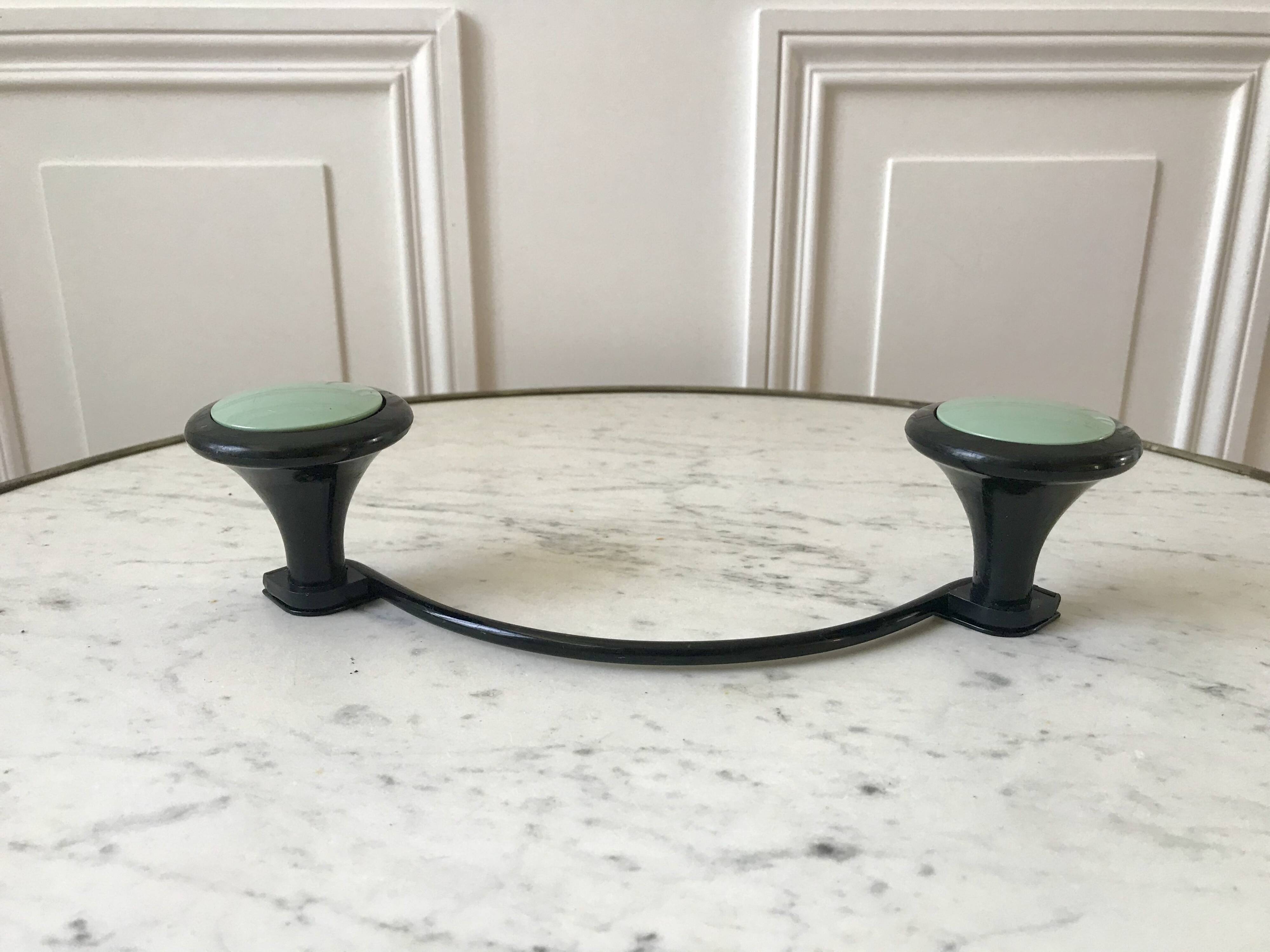Design coat hook in sage green and black metal from the 70s