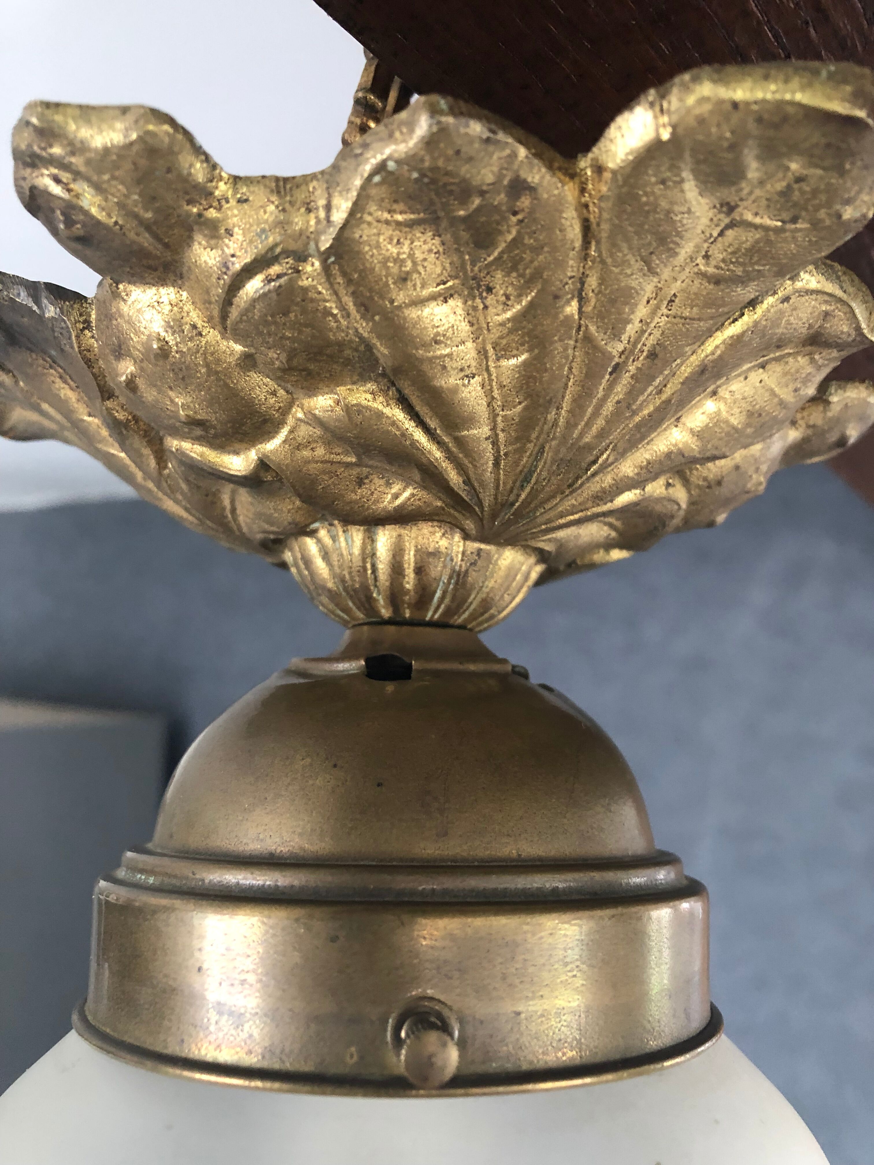 Bronze ceiling lamp and glassware