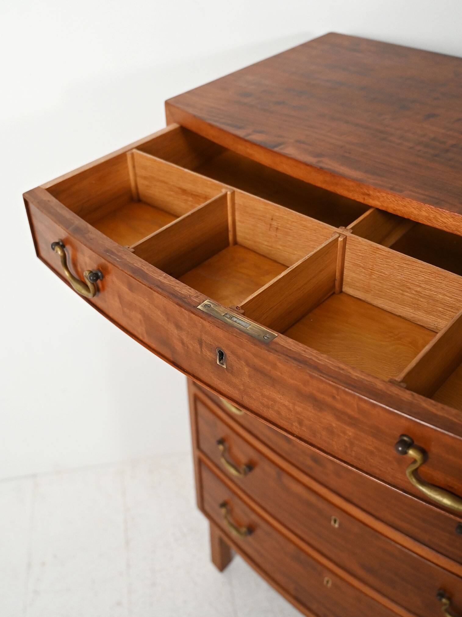 Scandinavian mahogany tallboy with brass handles