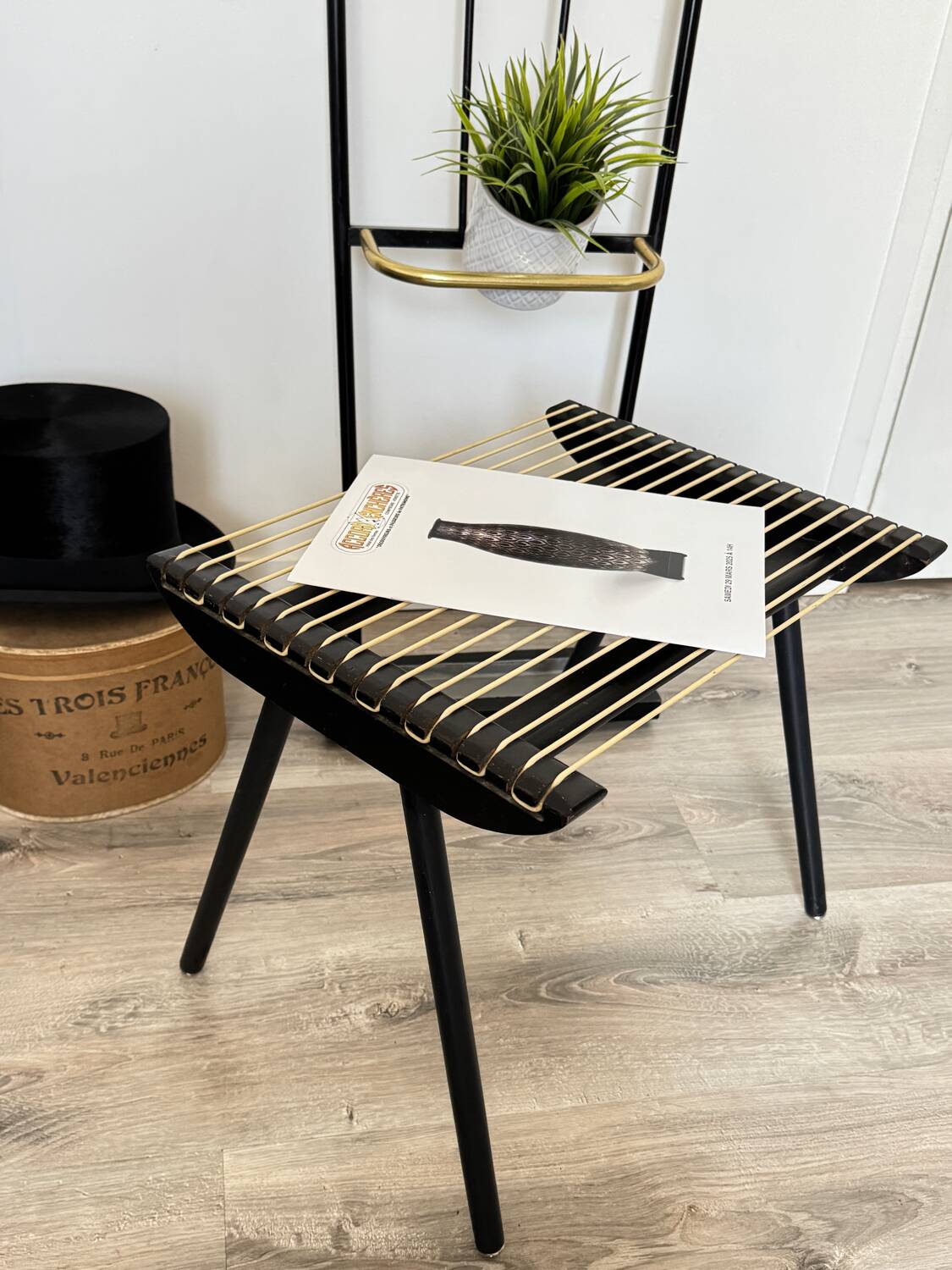 Vintage black Georges Tigien stool