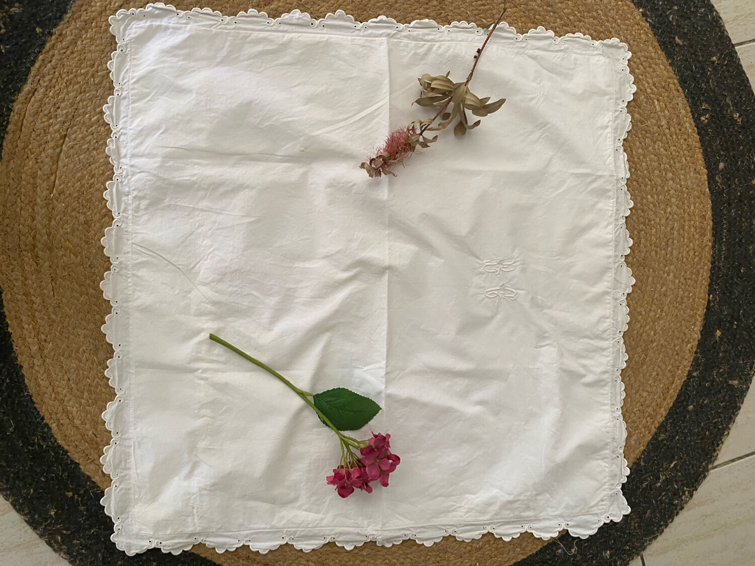 White cotton pillowcase with monogram BC.