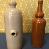 Duo of sandstone bottles