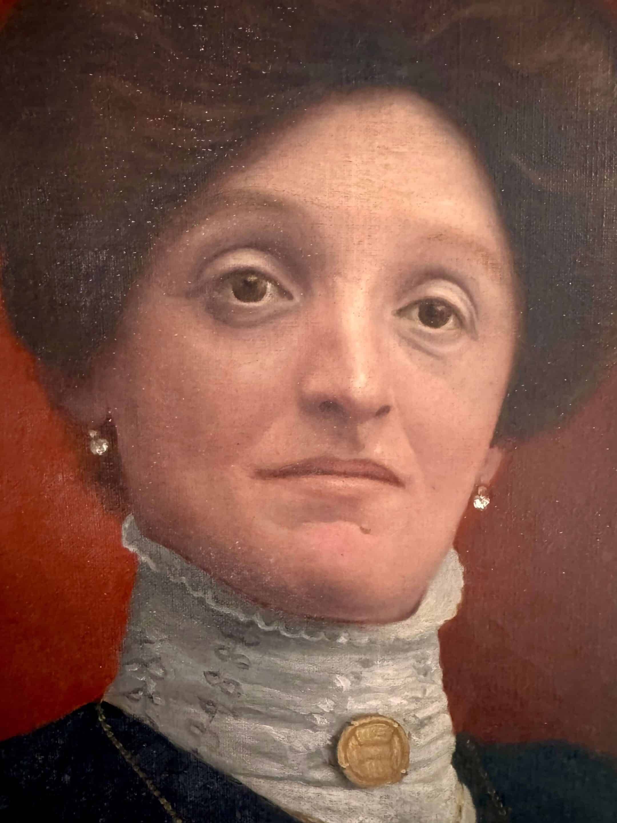 Old painting, portrait of a woman from the early 20th century.