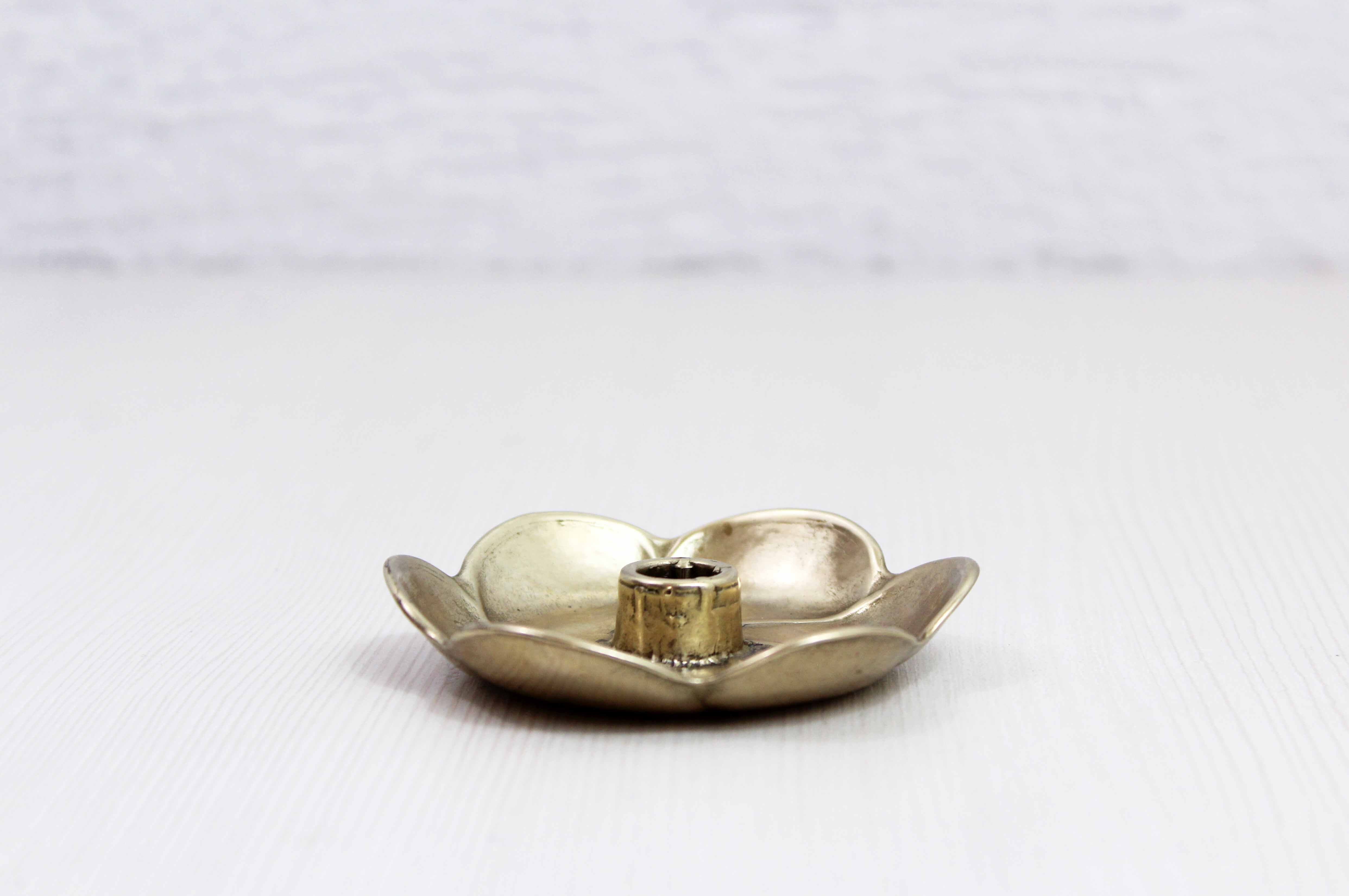 Brass flower candle holder