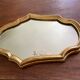 Miroir doré de style Louis XV sobre 32 X 22