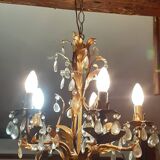 Very pretty chandelier with tassels and leaves in gold sheet metal.