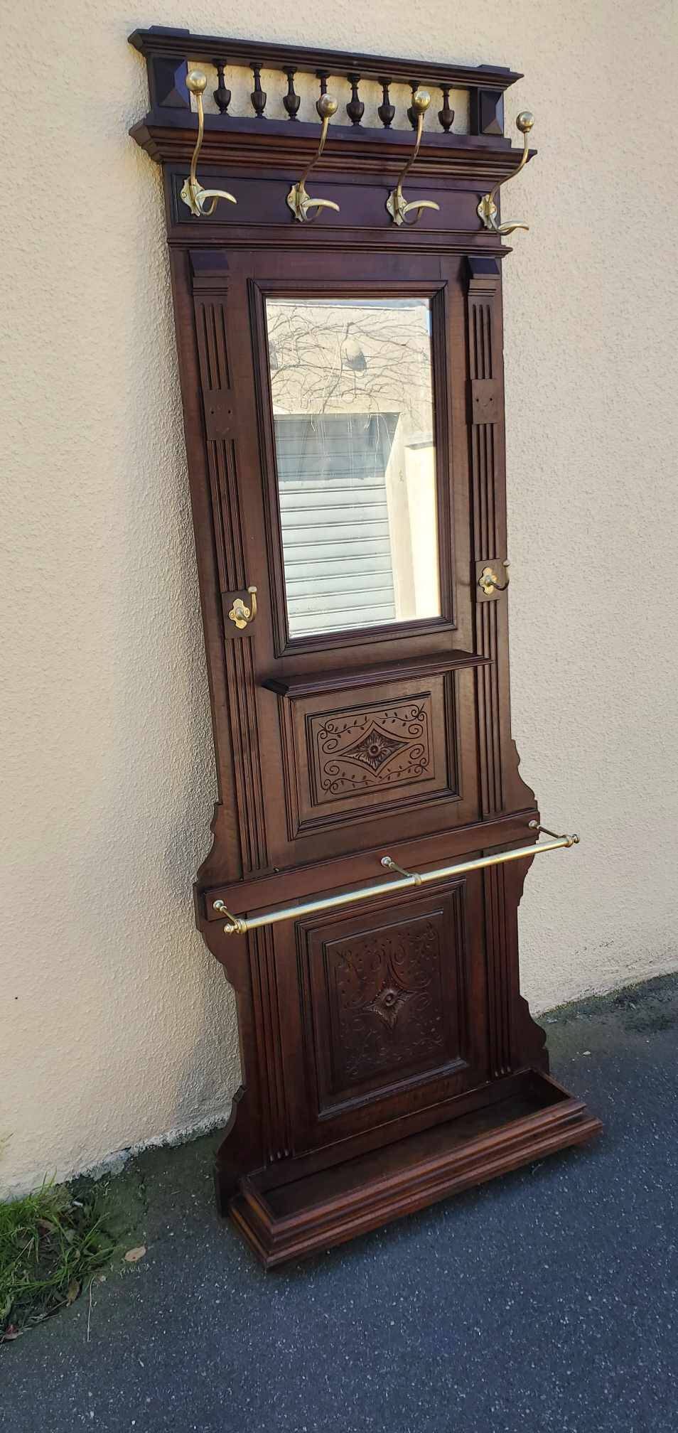 Old and beautiful wooden coat rack cloakroom early 20th century