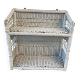 White wicker wall shelf