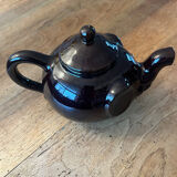 Brown ceramic teapot