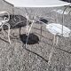 Old wrought iron garden furniture, table + 2 armchairs + 2 chairs