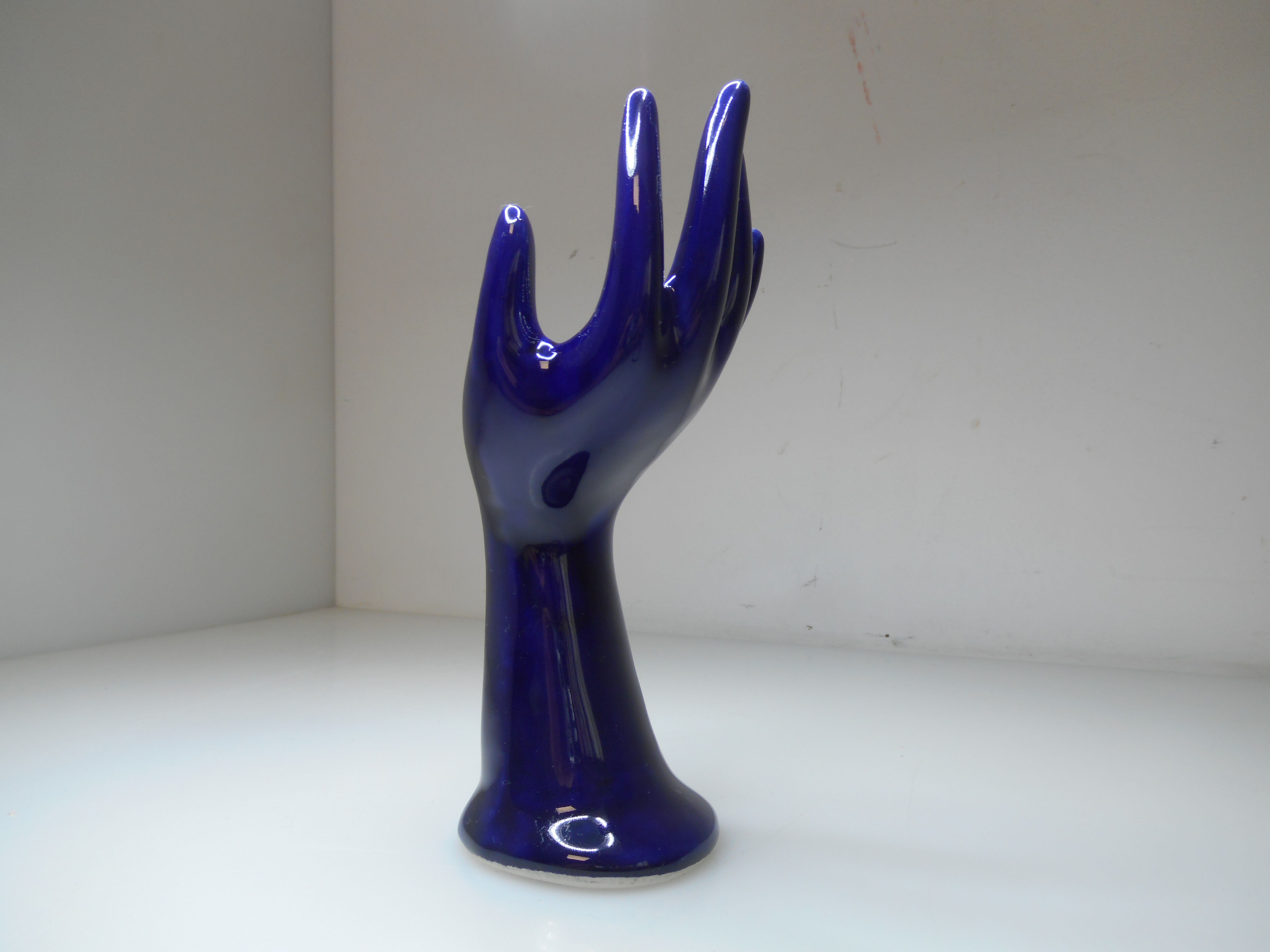 Vintage blue ceramic hand