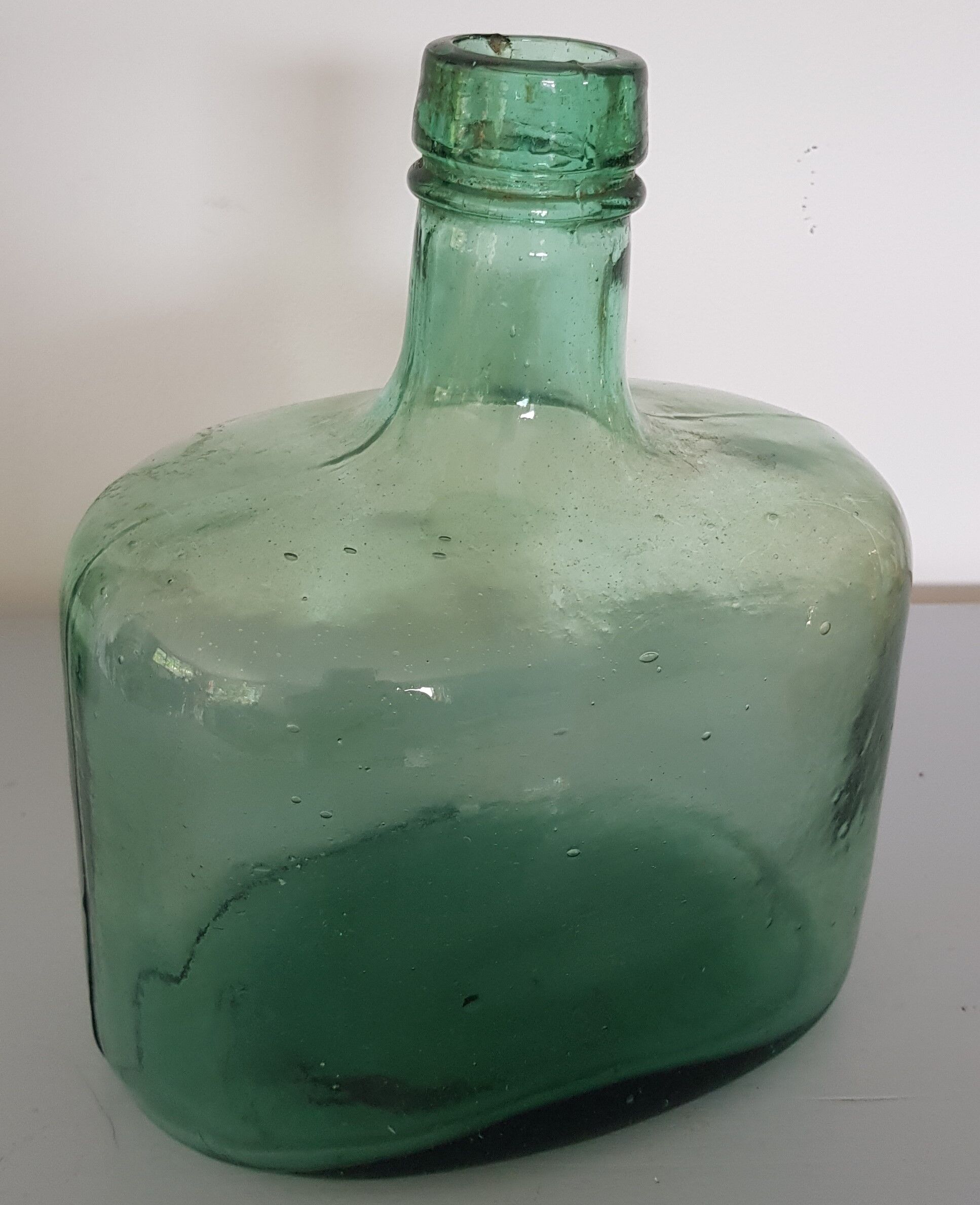 Bluish green bottle