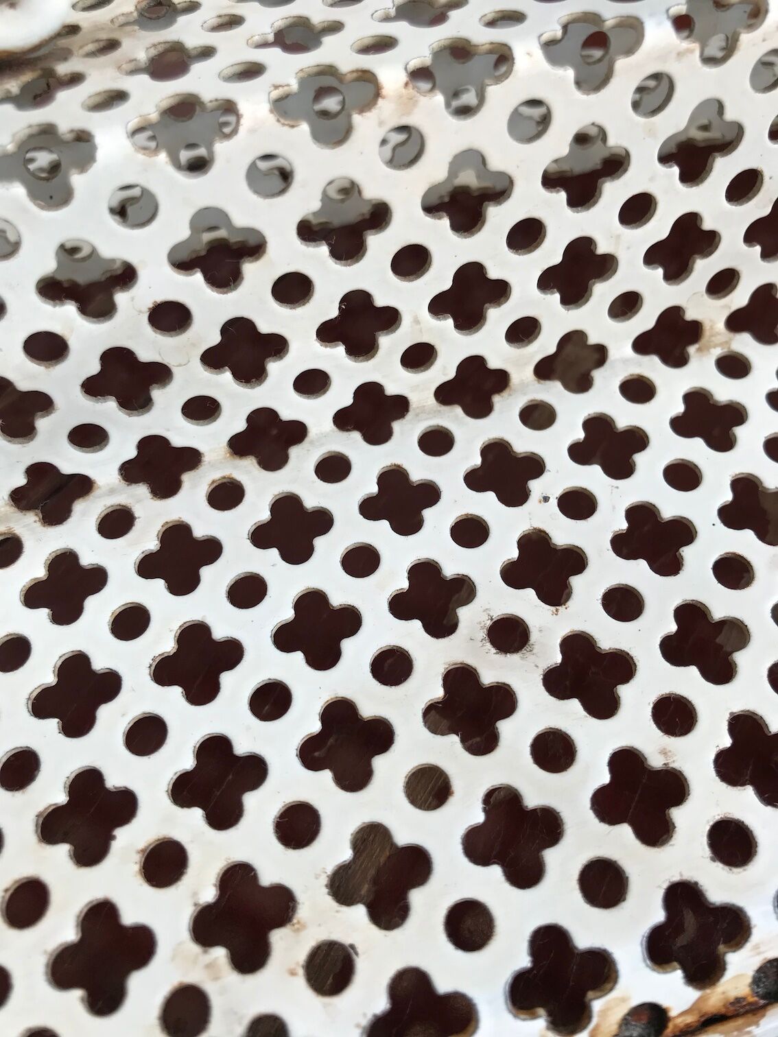 Perforated metal glass basket