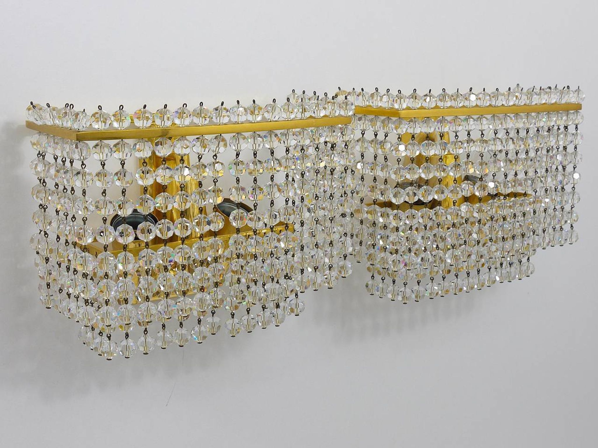 Pair of square wall sconces in gilded brass with hand-cut crystals, 1970s.