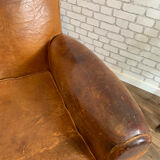 Club armchair in leather 1930