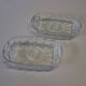 2 transparent glass ramekins with handles in very good condition.