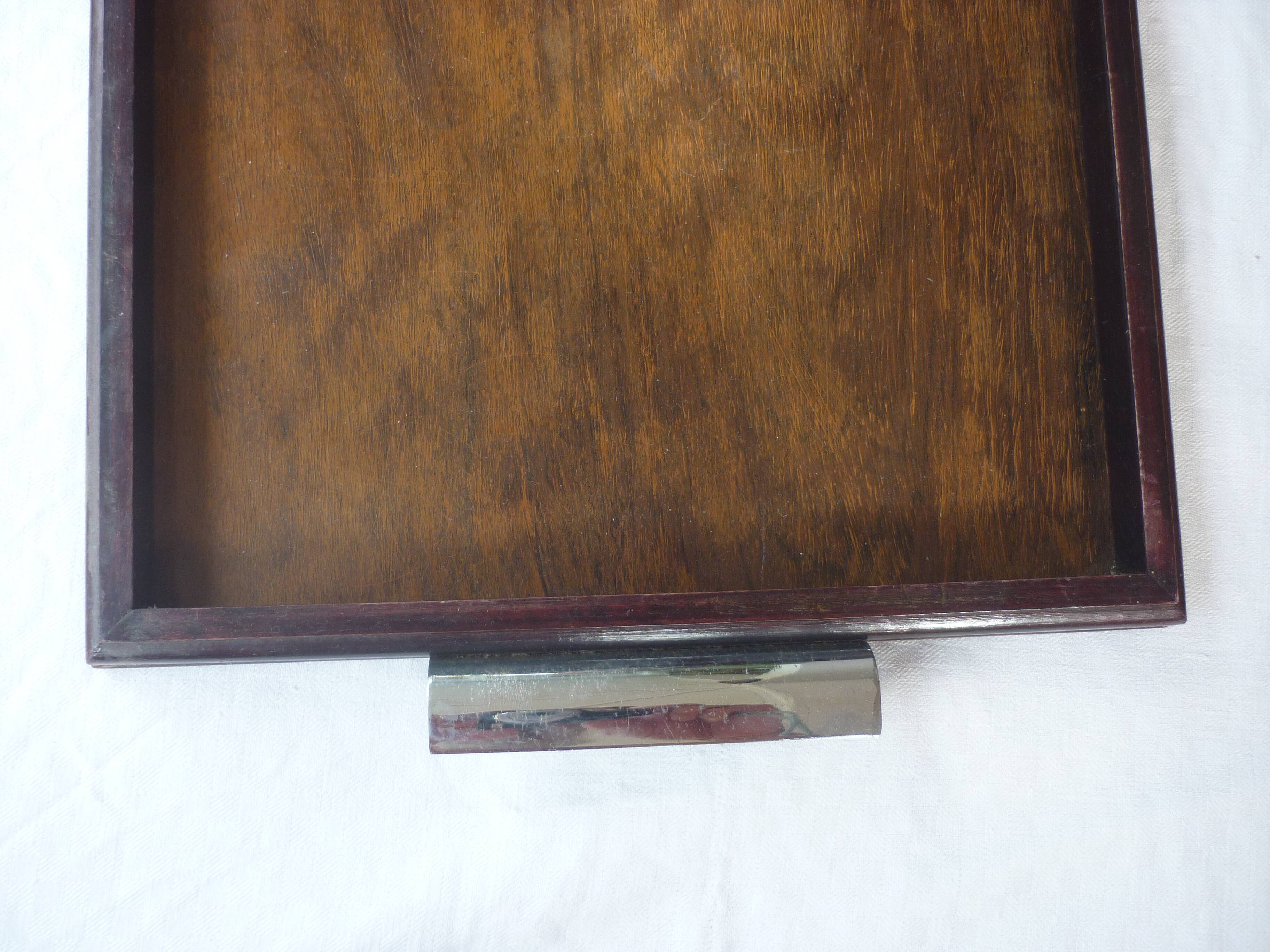 Wooden tray metal fists