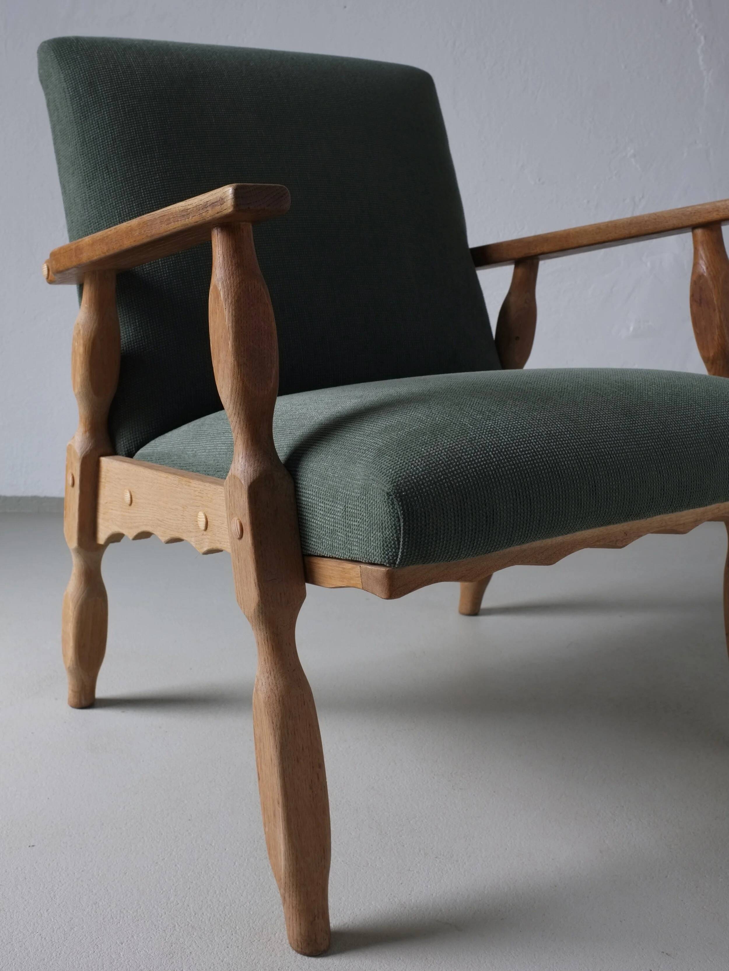 Henning Kjaernulf oak scalloped lounge chair | Denmark | 1950s