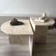 Half-moon travertine coffee table