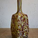 Yellow and white speckled decanter