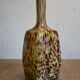 Yellow and white speckled decanter