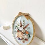 Frame domed glass flowers in fabric