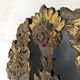Pediment in blackened wood and 19th century embossed gilded metal foil