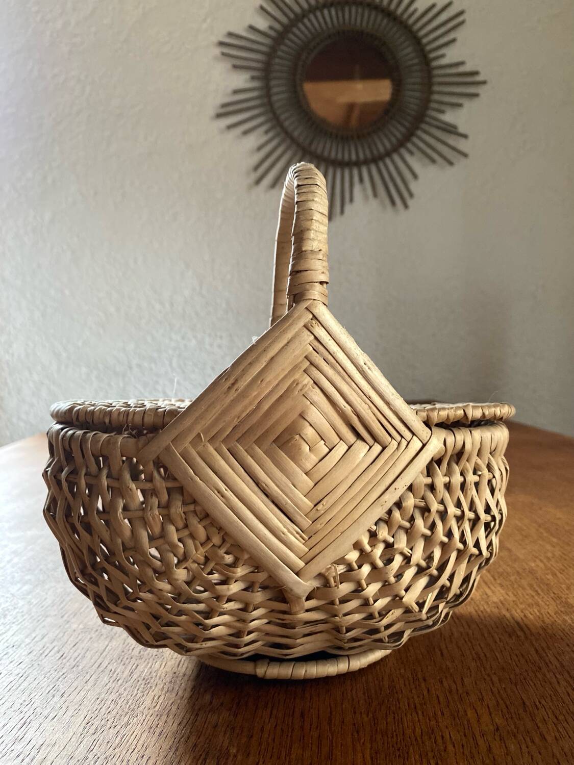 Handcrafted egg basket made of woven rattan and wicker