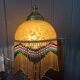 Lampe laiton perles style Charleston 1930