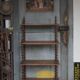 Napoleon III spool shelf, floor-standing shelf with brass tips.
