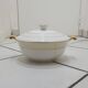 White and yellow porcelain dinner service with gold edging, Poral Limoges France