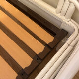 Vintage white rattan bed from the 1960s.