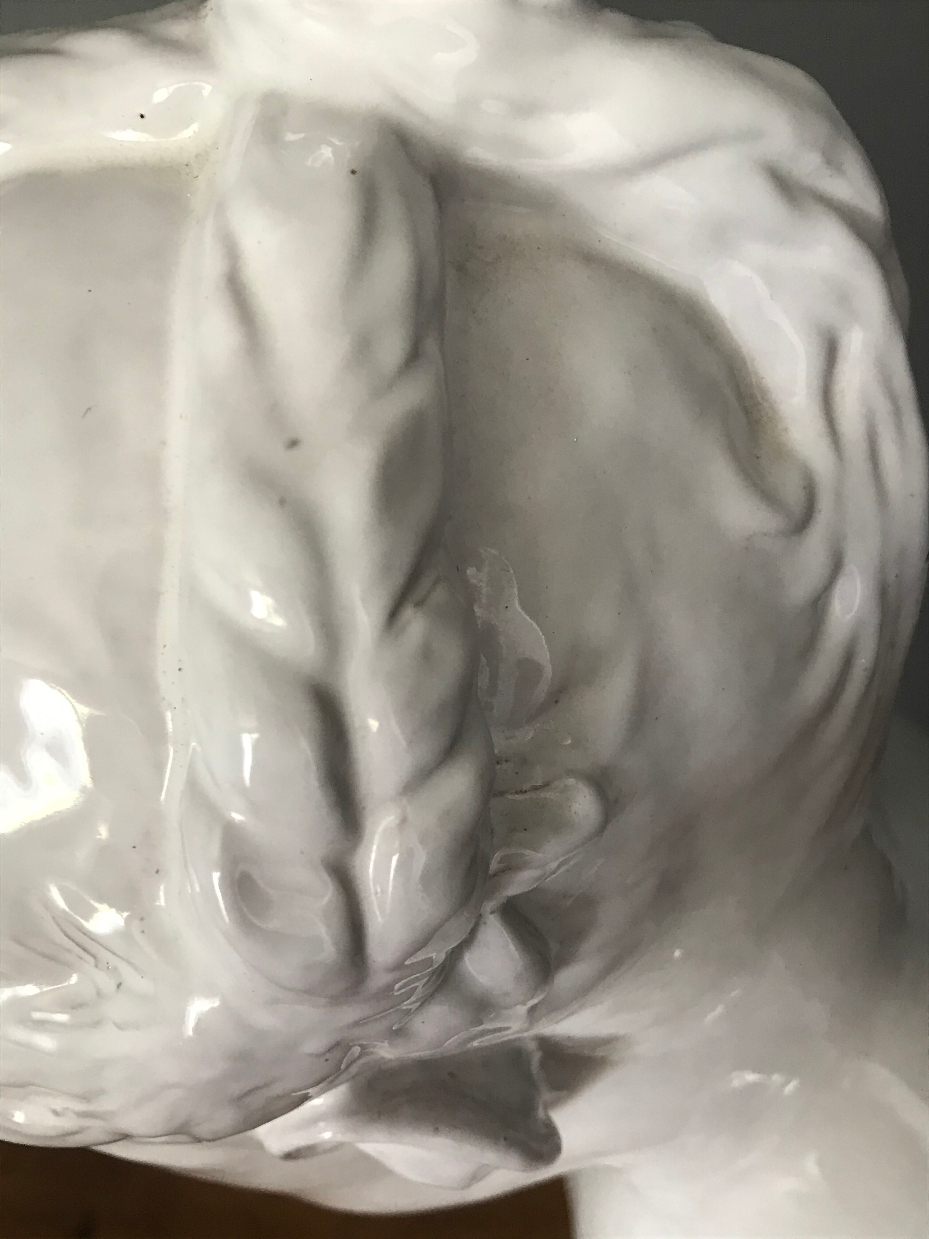 Child bust in enamelled terracotta