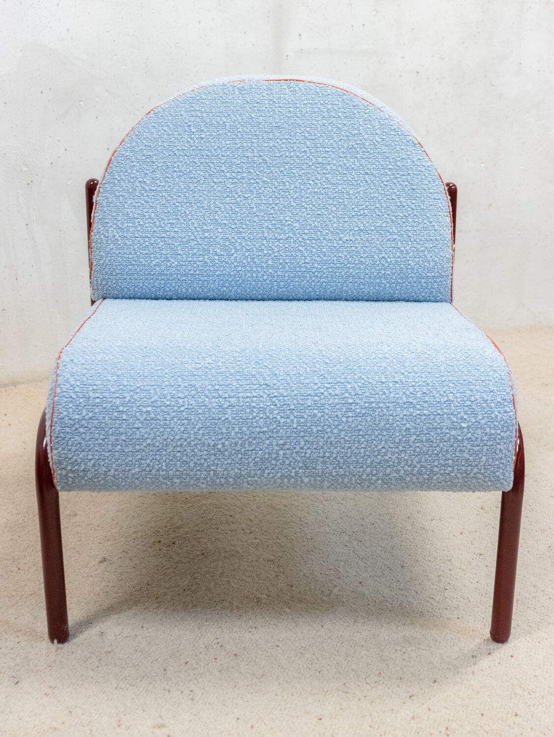 Souvignet armchair reupholstered in sky blue boucle.