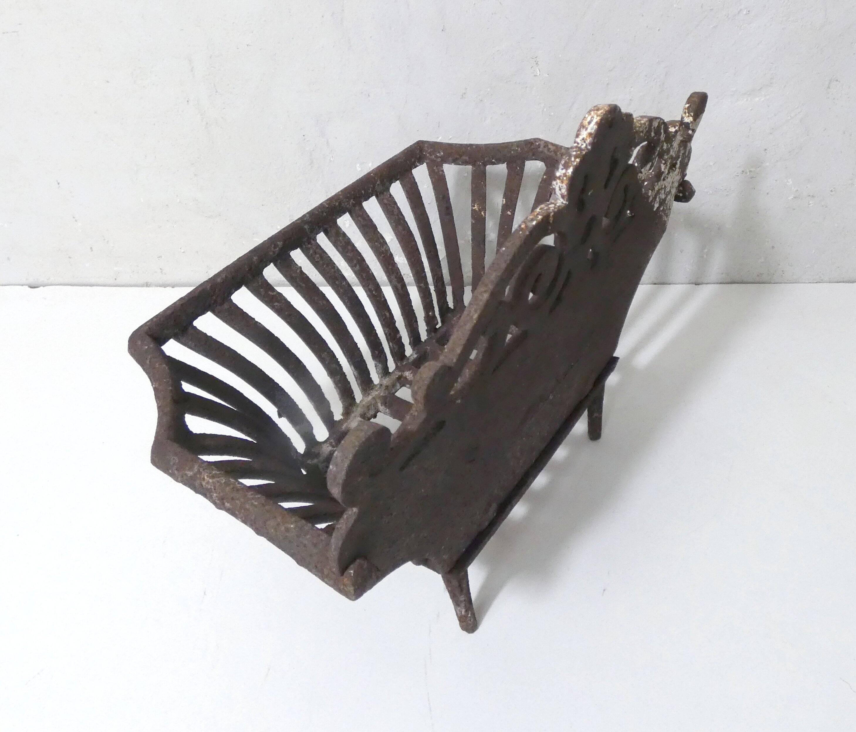 vintage cast iron log holder