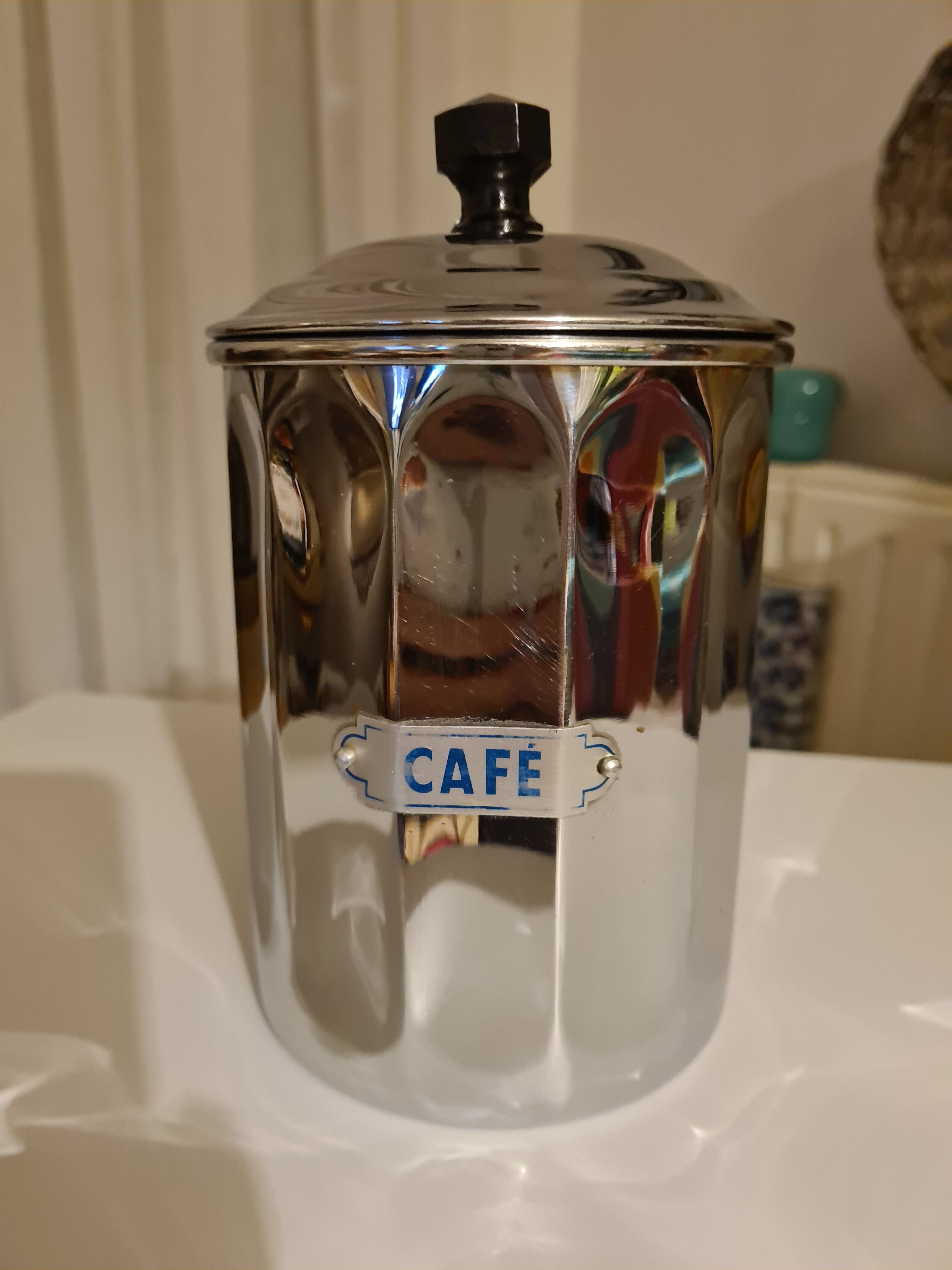 Vintage coffee pot in chrome metal