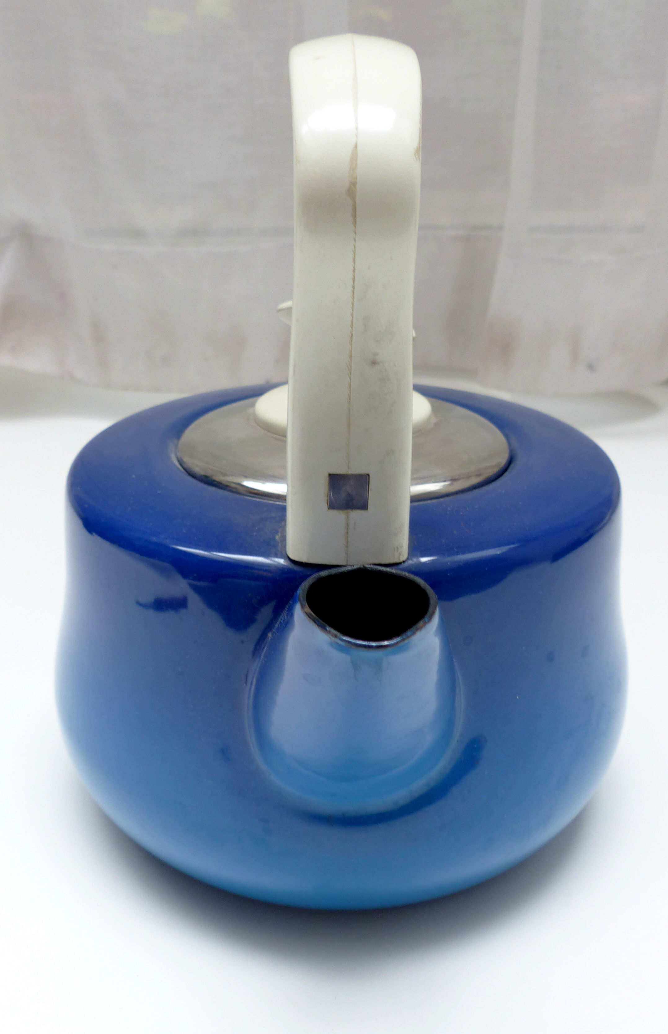 Old blue enamelled kettle