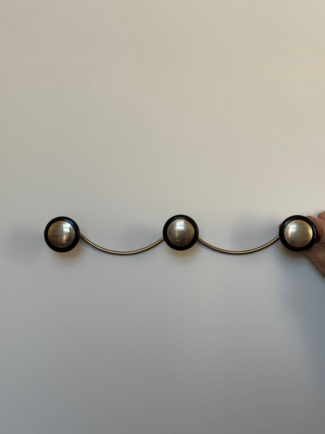 Wall mounted coat rack