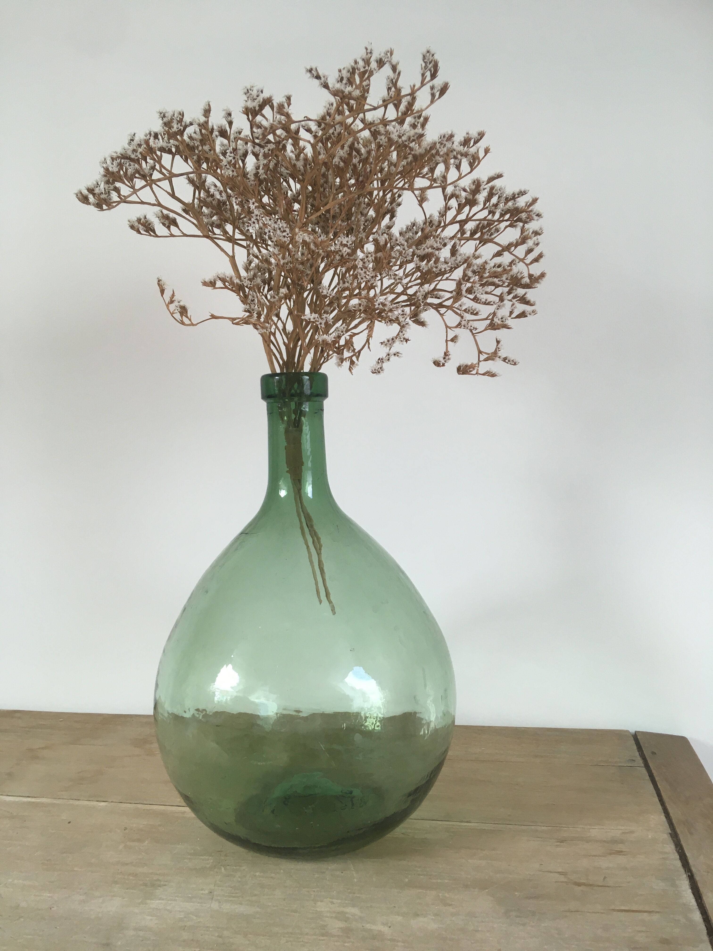 Vintage green demijohn