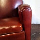 Club armchair with round back