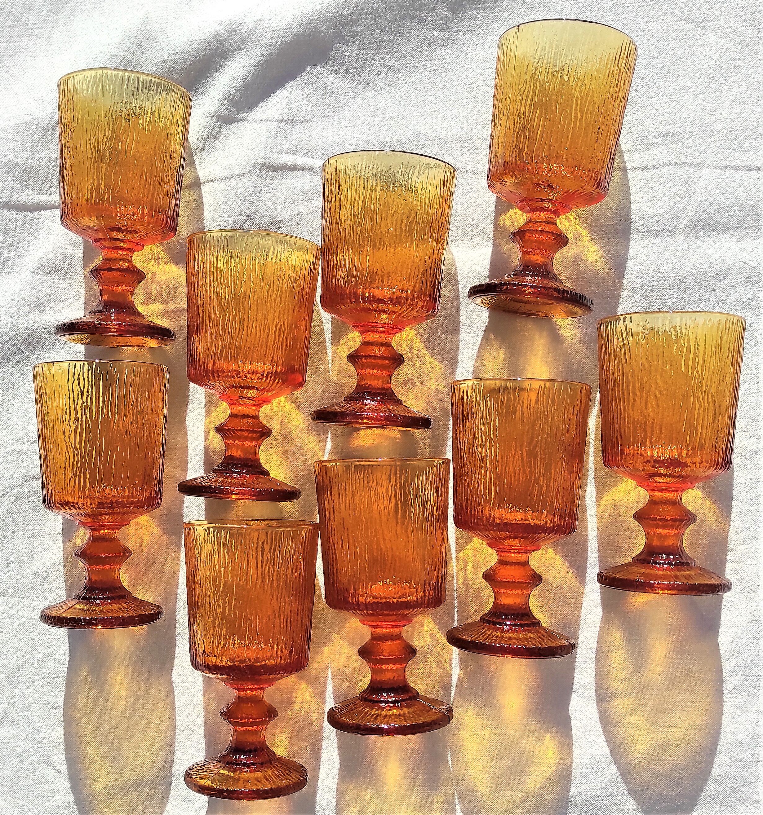 9 orange-stemmed wine glasses circa 1970